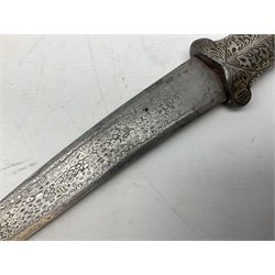 Indian Khanjar dagger with 28cm curving damascus steel blade inlaid with silver floral emblem, white metal and niello style grip in the form of a bird's head with pronounced beak and matching scabbard L44cm overall