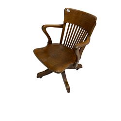 Early 20th century oak desk chair, swivel and reclining action, on castors