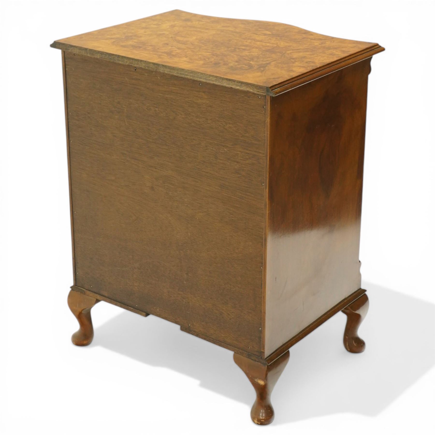 Queen Anne design figured walnut serpentine-front chest, fitted with four graduating cock-beaded drawers flanked by canted fluted uprights, on cabriole feet