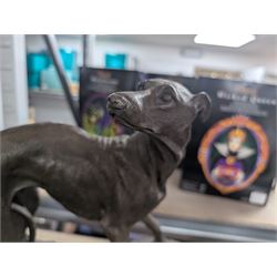 Two spelter dog figures, each upon hardstone bases, tallest H33cm