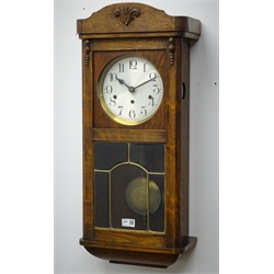  Early 20th century oak cased wall clock, triple train driven Westminster chiming movement, H75cm  