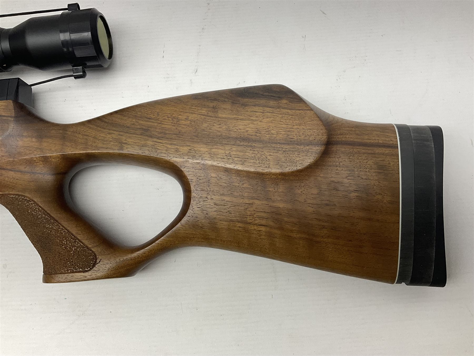 Weihrauch Sport HW100 .177 calibre PCP repeating air rifle; walnut thumbhole stock with textured pistol-grip; fourteen-shot magazine; Nikko Stirling Gameking 3.5 -10x44 illuminated telescopic sight; No.1922087 L90cm overall; in Napier fleece lined gun sling; with re-filling air tank and quantity of pellets NB: AGE RESTRICTIONS APPLY TO THE PURCHASE OF AIR WEAPONS.