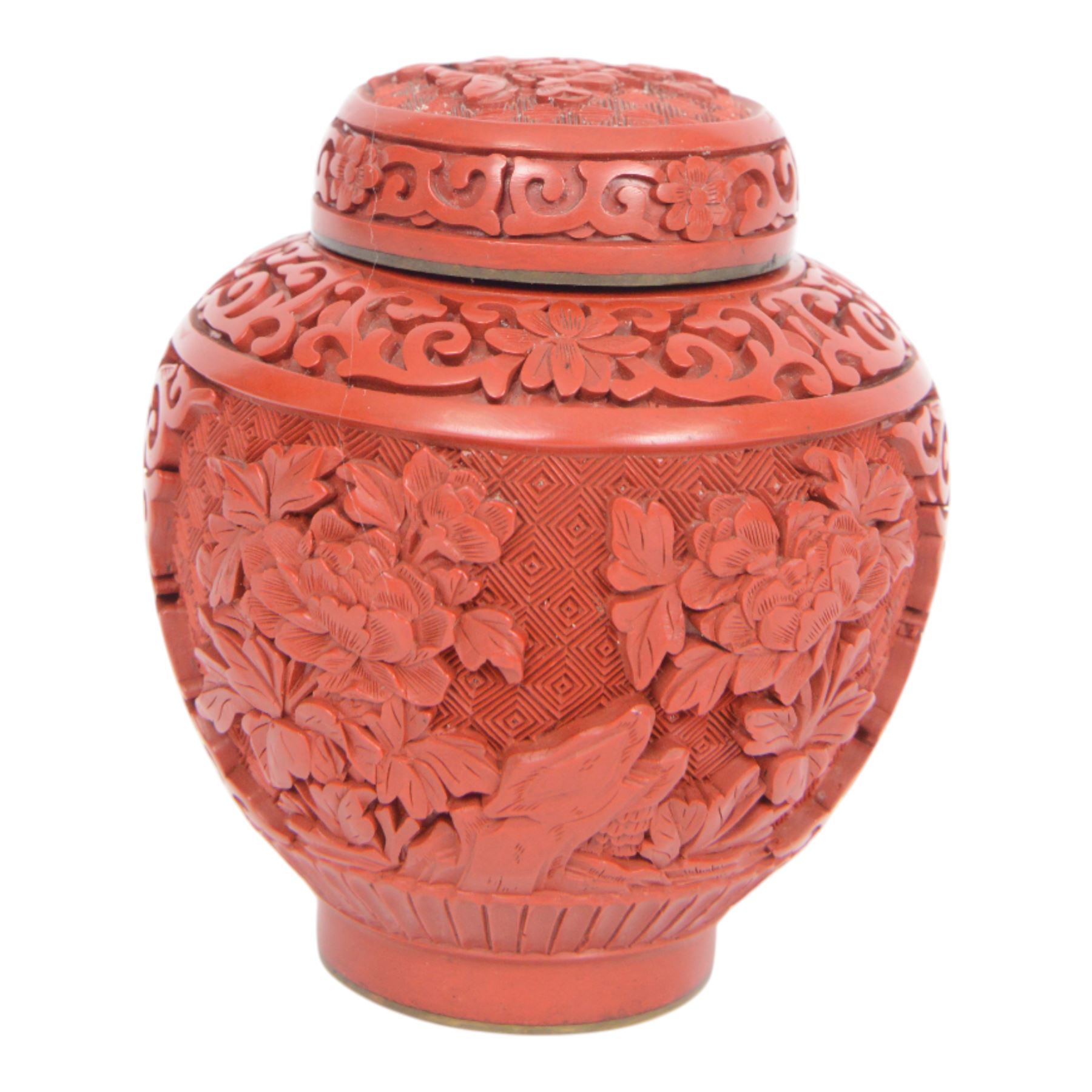 Near pair of Japanese plates, decorated in green, blue and iron-red enamels, with peacocks perched on a rock among foliage, together with Chinese cinnabar ginger jar, plates D21cm 