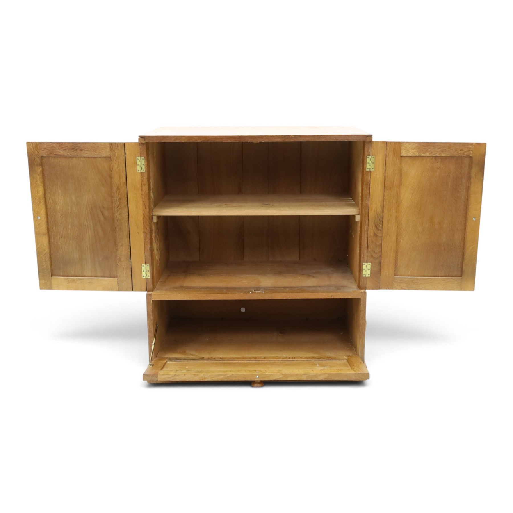 Lizardman - adzed oak media cabinet, adzed rectangular top above twin doors enclosing a shelved interior, above a fall front drawer, Yorkshire Rose carved handles, raised on castors, with carved lizard signature, by Derek Slater of Crayke  