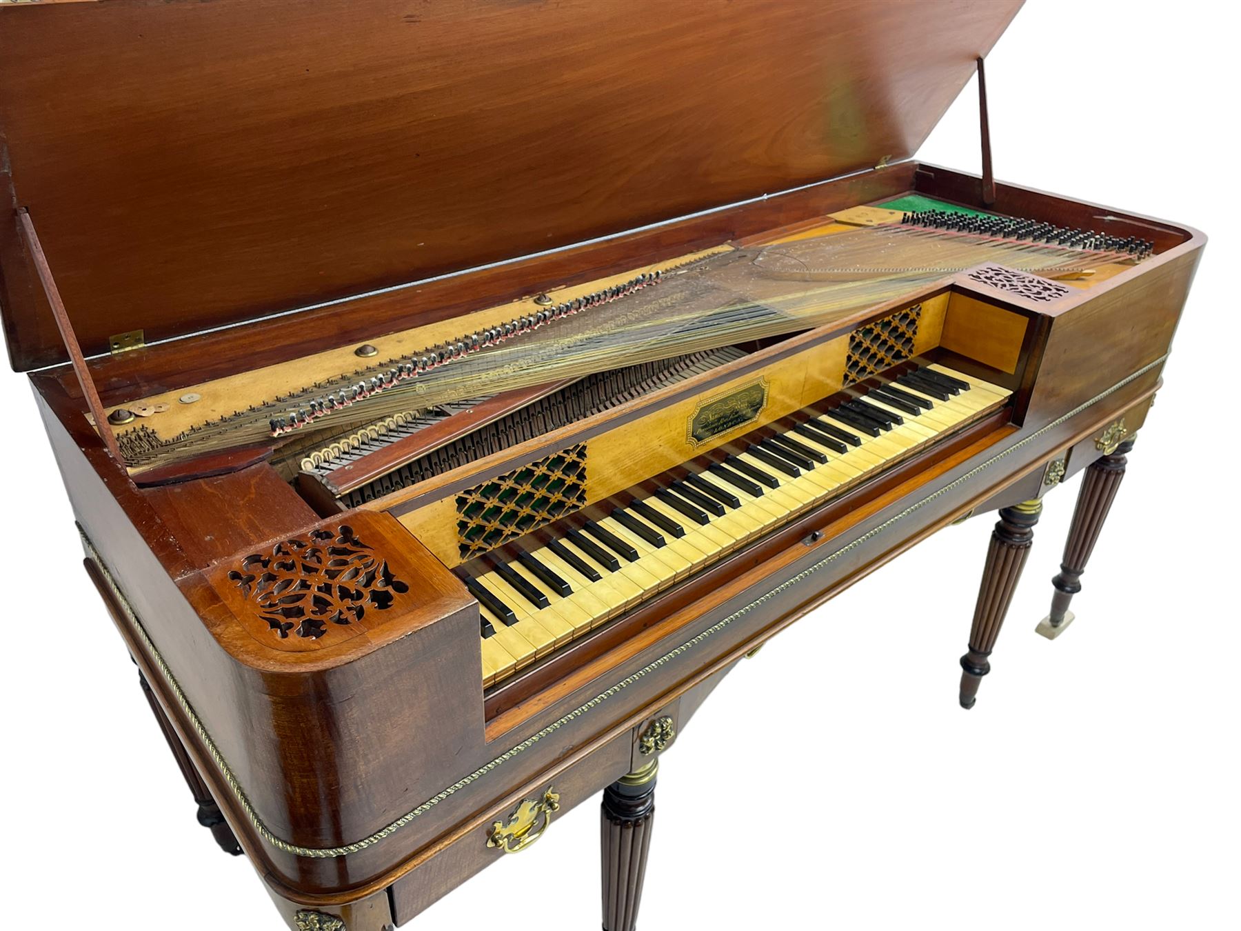 James Rigg, London -early 19th century mahogany and maple square piano c1817, with a 68 key compass (A-C) original hammers, jacks and felt, satinwood interior with ebony and ivory keys, the fretwork interior back inscribed 'James Rigg, 3 Providence Row, Finsbury Square, London', decorated with twist gilt metal edging, fitted with three drawers, on Gillows design turned and reeded supports with brass cups and castors.

This item has been registered for sale under Section 10 of the APHA Ivory Act