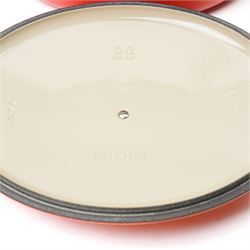 Le Creuset oval casserole dish and cover,  and another shallow example, in the Volcanic colourway
