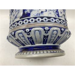 Three jardinières comprising West German Gerz example decorated in relief, Doulton Slaters example with frilled everted rim and a majolica example, and a further two Arthur Wood majolica jugs (5)