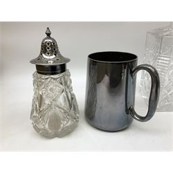 Quantity of assorted silver plated and other flatware, to include part sets, set of three silver plated cruets, glass sifter with silver plated cover, two glass decanters and stoppers, etc., in one box 