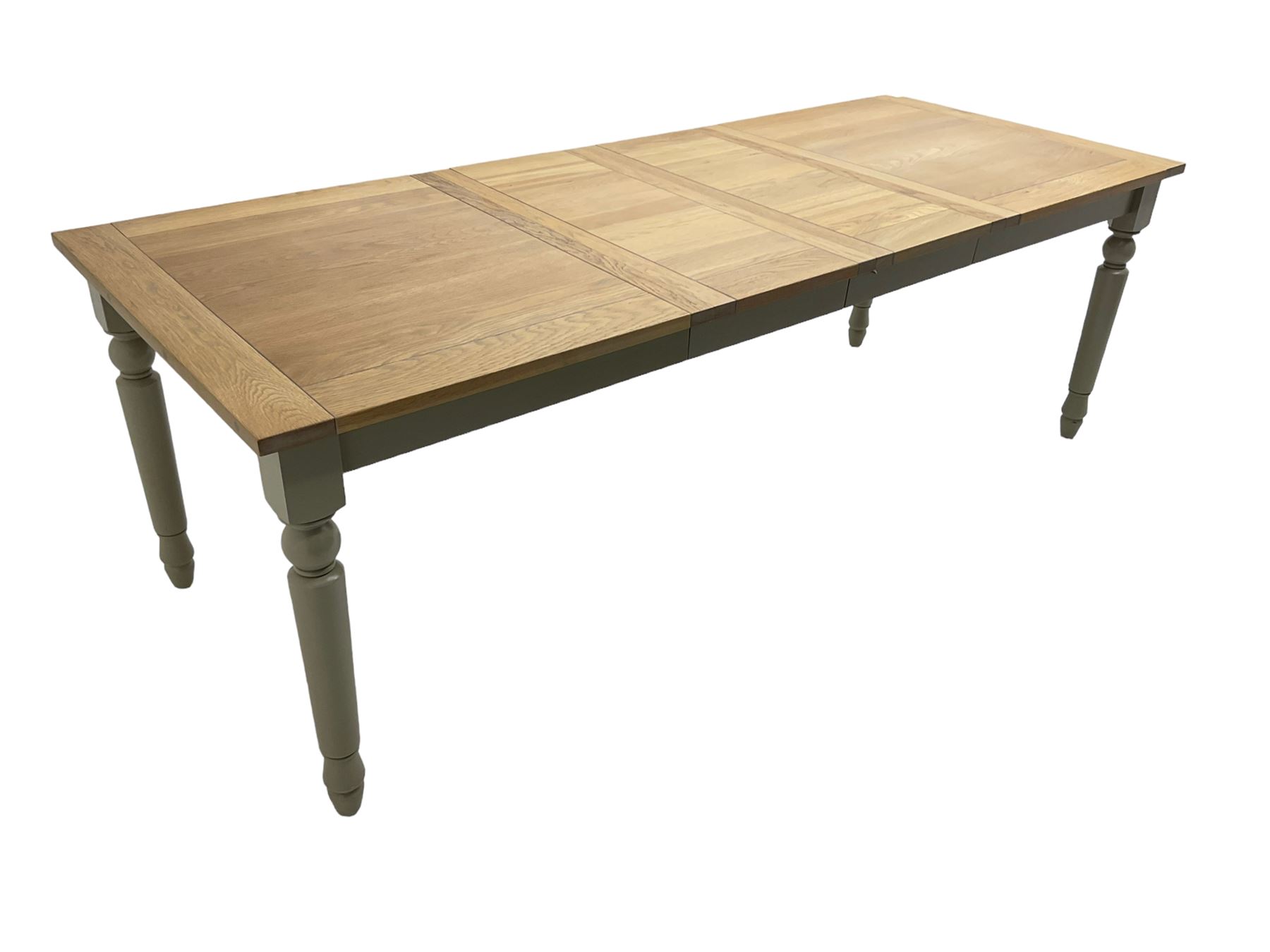 Neptune Furniture - 'Suffolk' oak dining table, pull-out extending top with two additional leaves, on turned supports, in grey paint and wax finish 