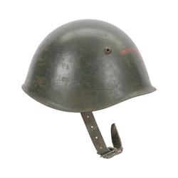 Italian G.N.R. (Guardia Nazionale Repubblicana) M33 helmet, circa 1943
The G.N.R were responsible for the internal security of the Italian State repubblic of Salo, after 1943 members of the security force consisted of ex carabinieri, fascist militaria men from the M.V.S.N and those who served in the P.A.I Italian African Police. 
