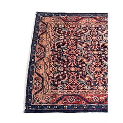 North West Persian Mahal indigo ground runner rug, the field decorated with all-over crimson Herati motifs, the guarded border with trailing geometric designs