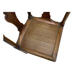 18th century oak corner elbow chair, the shaped cresting rail terminating to swept arm rests, supported by turned columns and vase-shaped splats, over square plank seat, raised on square-section supports