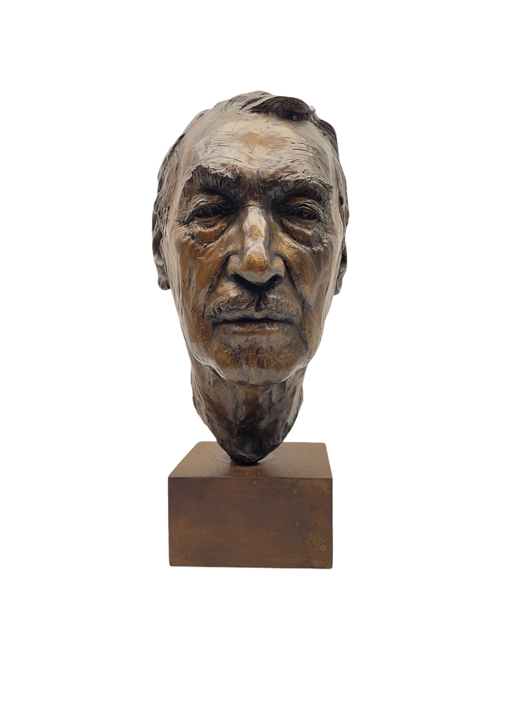 Anne Curry (French 1943-): Bronze bust modelled after the artist's late Grandfather, signed and dated '95 and numbered 1/5 on square wooden plinth, H41cm overall. Provenance: This piece was a gift from the artist's father to the vendors late mother in law. The portrait depicts the artist's late Grandfather who was a friend of the family