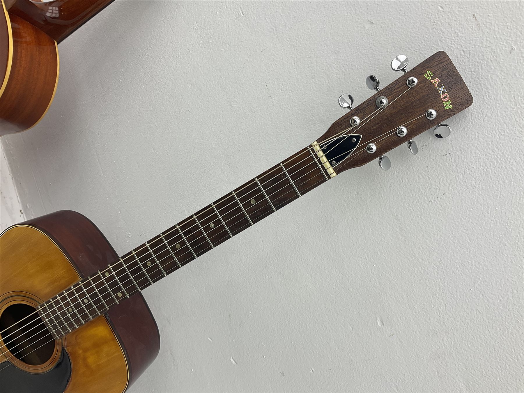Saxon acoustic guitar Folk Model 812, serial no.43263 L102cm; Jose Ferrer El Primo small or child's size acoustic guitar, serial no.006980 L85cm; both in carrying soft cases; and Spanish Admira Concert Grande acoustic guitar (3)