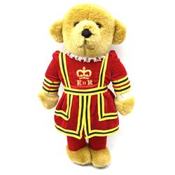 Four Merrythought teddy bears - International Collectors Club limited edition with growler mechanism No.71; plain brown with back-wind musical movement; golden brown dressed as a Beefeater; and earlier light golden coloured (4)