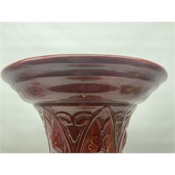 Bretby Jardiniere and stand, with foliate and foliage decoration with a red and yellow ground, impressed mark beneath H94cm