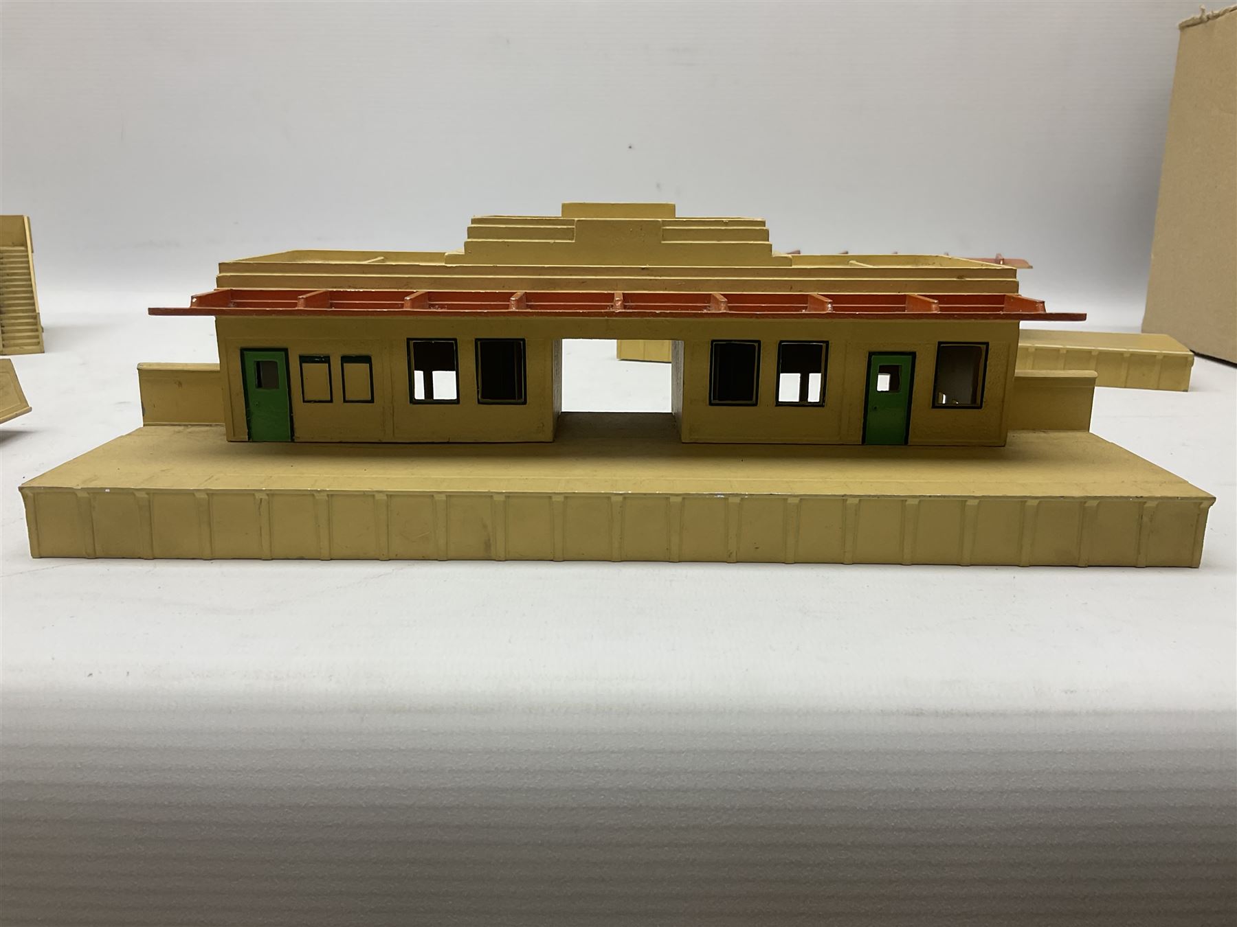 Hornby Dublo - two stations, signal box, 3-piece platform, footbridge, girder bridge etc; and other die-cast trackside and station accessories; all unboxed