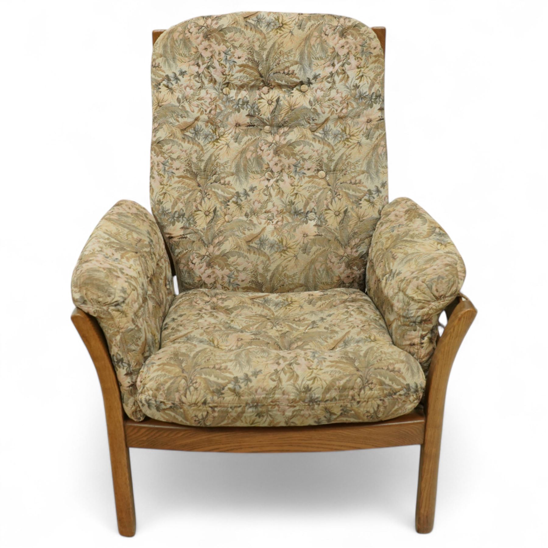 Ercol - golden elm 'Saville' armchair and matching footstool, elm frames with curved back supports and slatted sides, removable cushions upholstered in floral tapestry fabric, footstool (H 39cm, W 59cm)