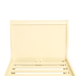 Modern white painted single sleigh bed frame and mattress, with scrolled head and footboard with foliage detail