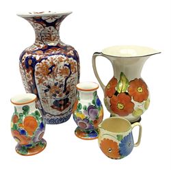20th century Japanese imari vase, of baluster form with waisted neck and fluted body, H29.5cm, together with a small group of Art Deco style ceramics decorated in the manner of Gray's Pottery with flowers, in one box 