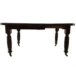 Edwardian walnut extending dining table, with leaf and winding handle