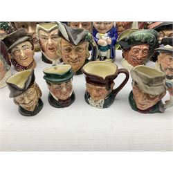 Collection of Royal Doulton and Beswick character jugs of various sizes, including North American Indian D6611, The Falconer D6533,  Tony Weller 281, Sairey Gamp 371 etc