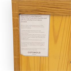 Cotswold & Co - large light oak media stand, rectangular top above central open shelf, double drawer flanked by two panelled cupboard doors, fitted with metal cup and knob handles