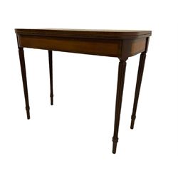 Early 19th century tea table, rectangular fold-over top with rounded corners, the frieze and sides inlaid with satinwood panels, double gate-leg action base, on reeded supports 