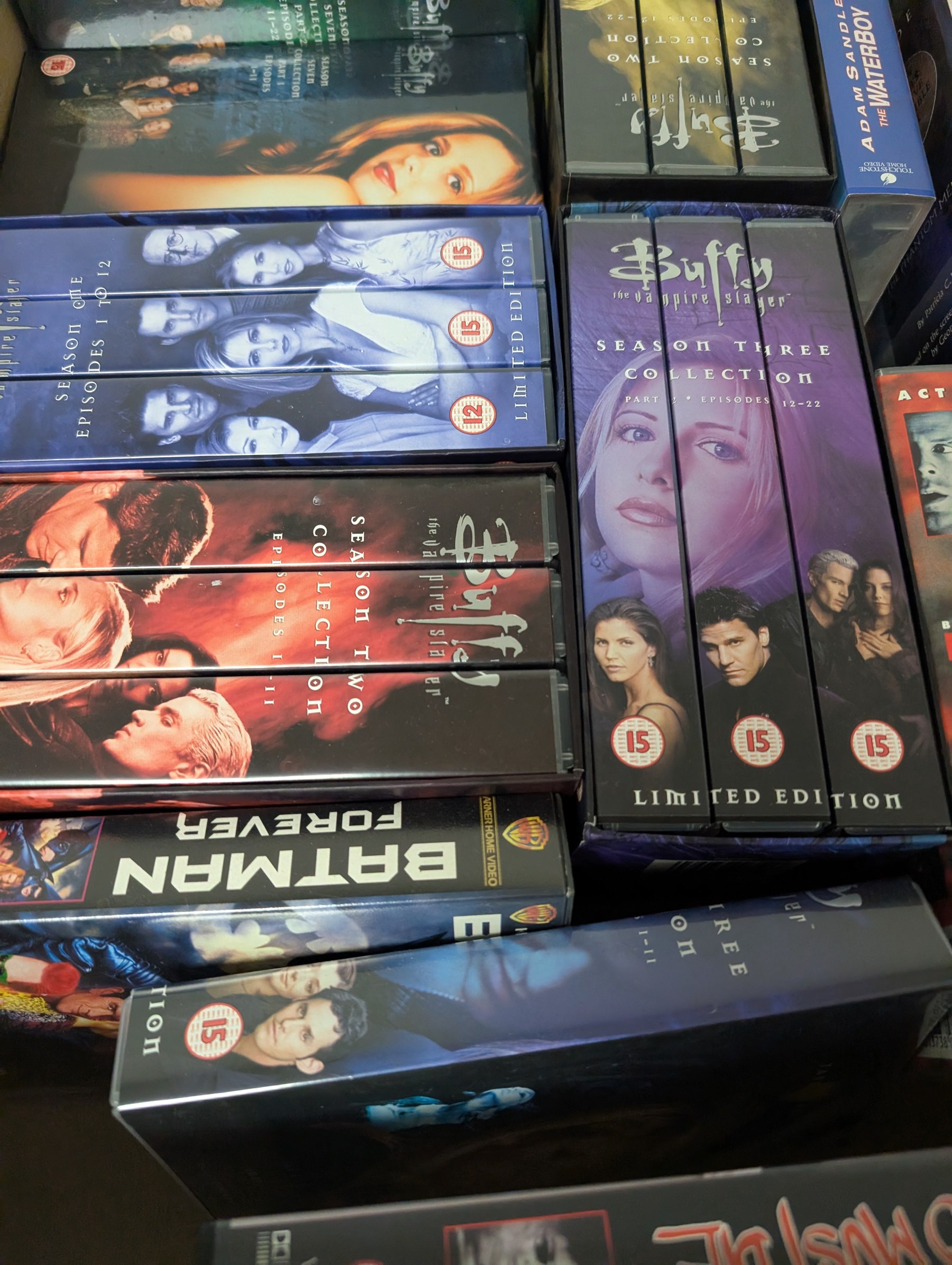 Collection of Sci-Fi and other classic film and TV VHS tapes, DVDs and Blu Rays, including Buffy, Doctor Who, Angel, etc, in four boxes