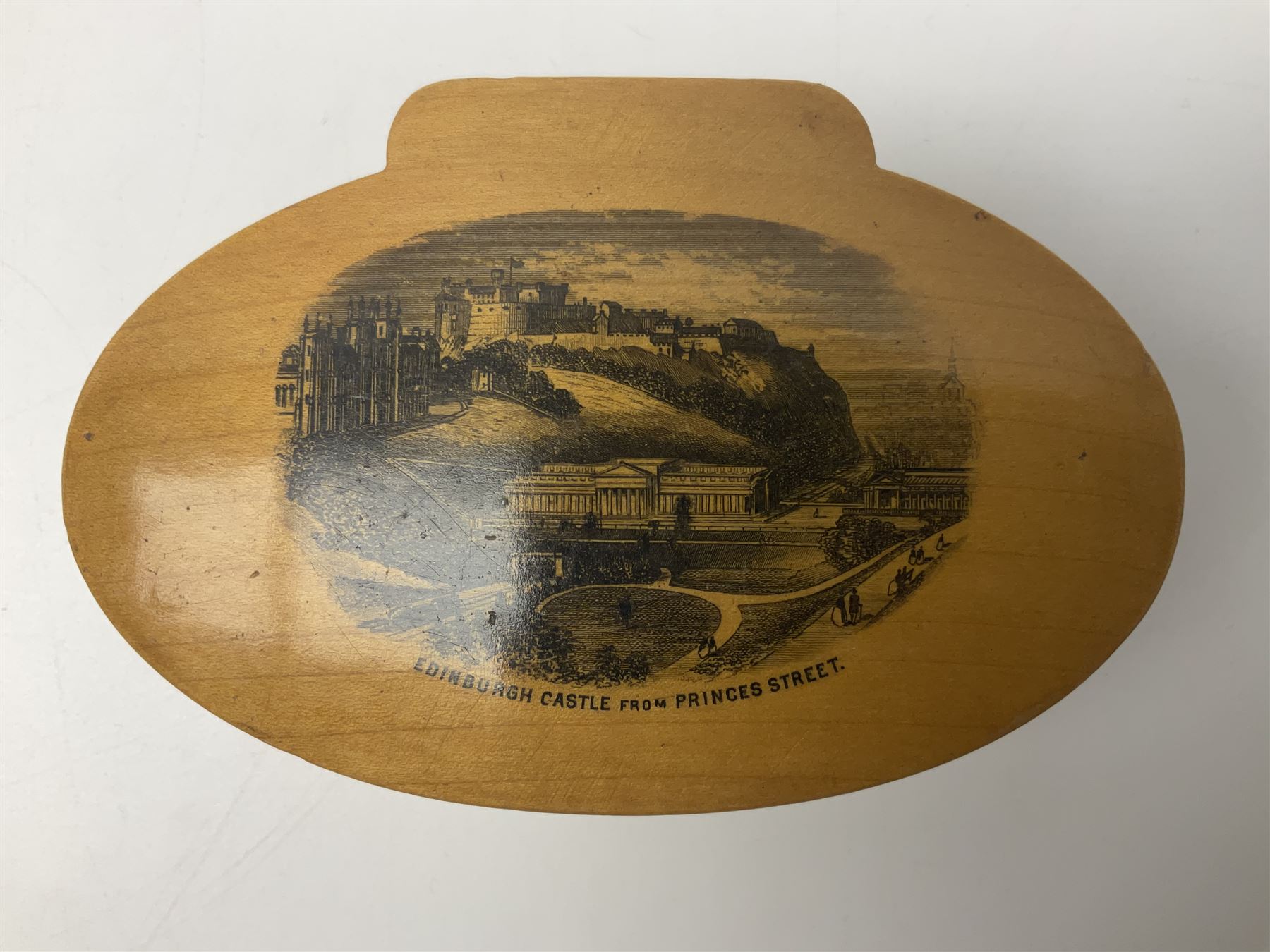 Six sewing related Mauchline ware comprising an oval reel box with internal label for Clark & Co's, tape measure, pin case and three thimble holders of ovoid form 