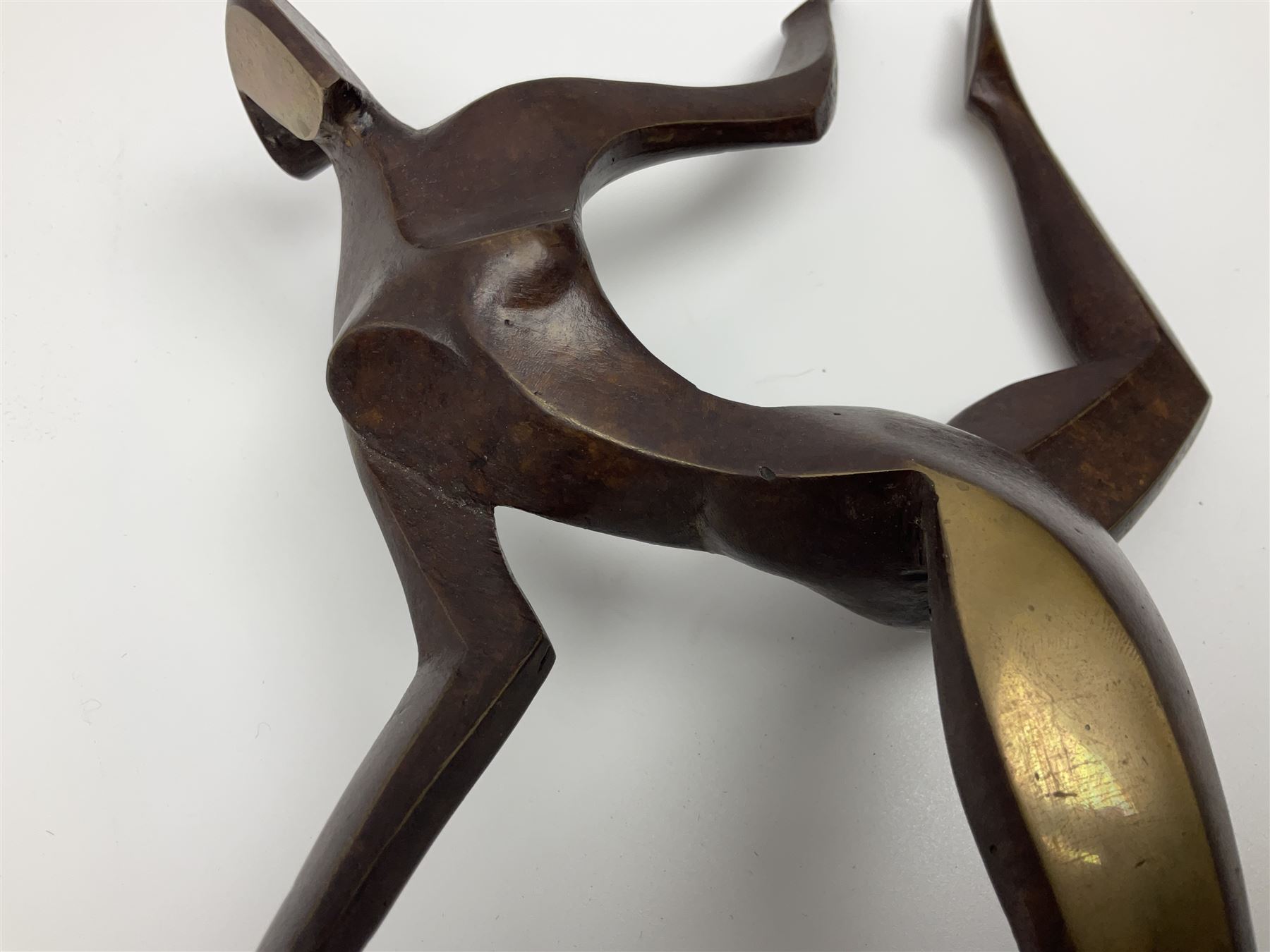 John Huggins FRBS (British 1938): 'Girl with Hoop', bronze sculpture upon black lacquered wooden base, H33cm, artist resale rights apply