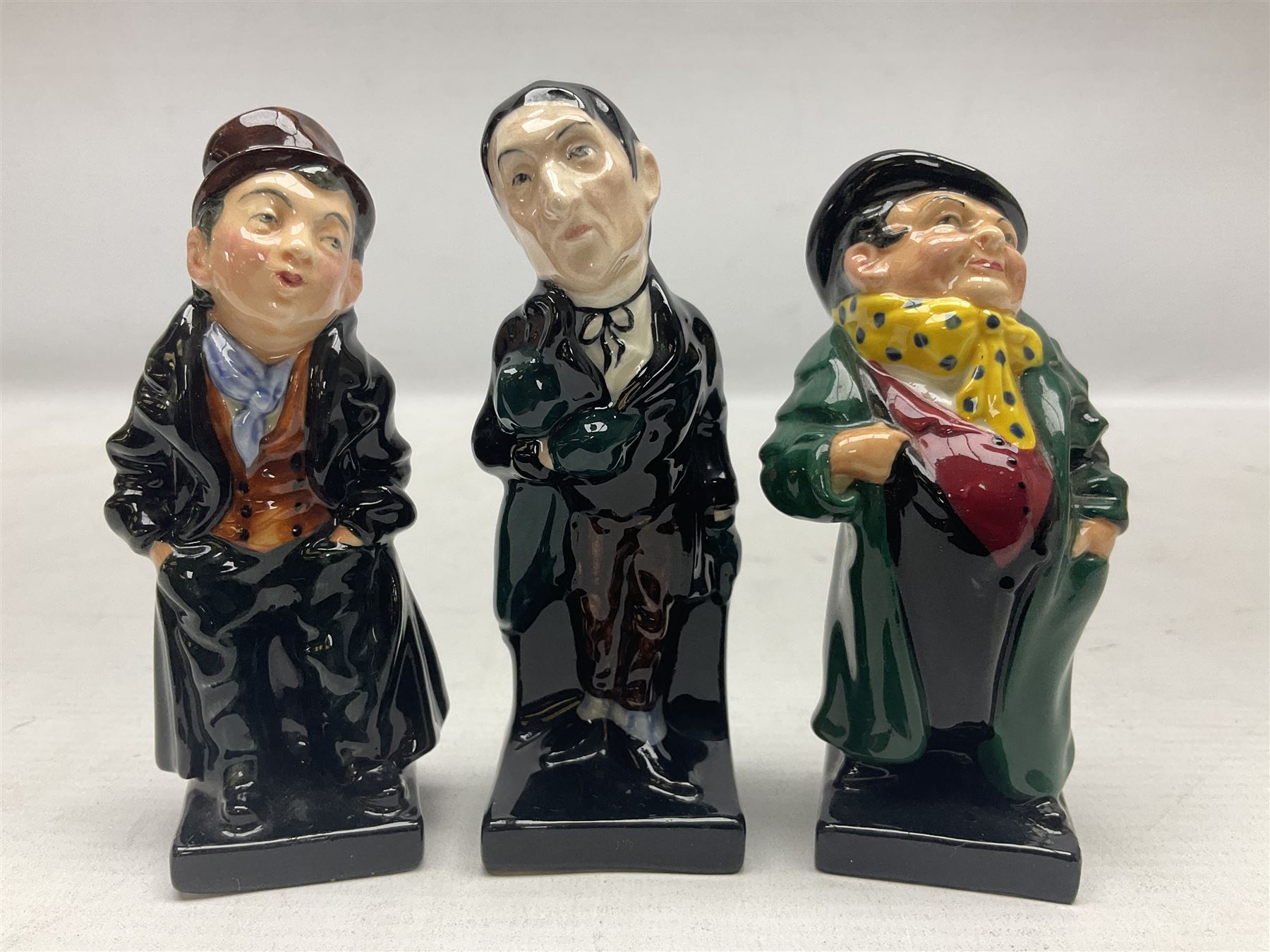 Sixteen Royal Doulton Charles Dickens figures, to include Oliver Twist, Fat Boy, Fagan, Stiggins etc, all with printed marks beneath