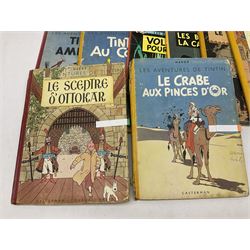 Twenty one first edition Herge, 'The Adventures of Tin Tin' books published by Casterman Bruxelles, with French text and coloured comic strip illustrations throughout; comprising Tintin Au Congo 1946, Tintin En Amerique 1946, Les Cigares du Pharaon 1955, Le Lotus Bleu 1946, L'Oreille Cassee 1943, L'ile Noire 1943, Le Sceptre d O'ttokar 1947, Le Crabe Aux Pinces D'or 1943, L'Etoile Mysterieuse 1942, Le Secret de la Licorne 1943, Le Tresors de Rackan Le Rouge 1945, Les 7 Boules de Cristal 1948, Le Temple du Soleil 1949, Au Pays de L'Or Noir 1950, Objectif Lune 1953, On a Marche sur la Lune 1954, L'Affaire Tournesol 1956, Coke en Stock 1958, Tintin au Tibet 1960, Les Bijous de la Castafiore 1963 and Vol 714 Pour Sydney 1968
