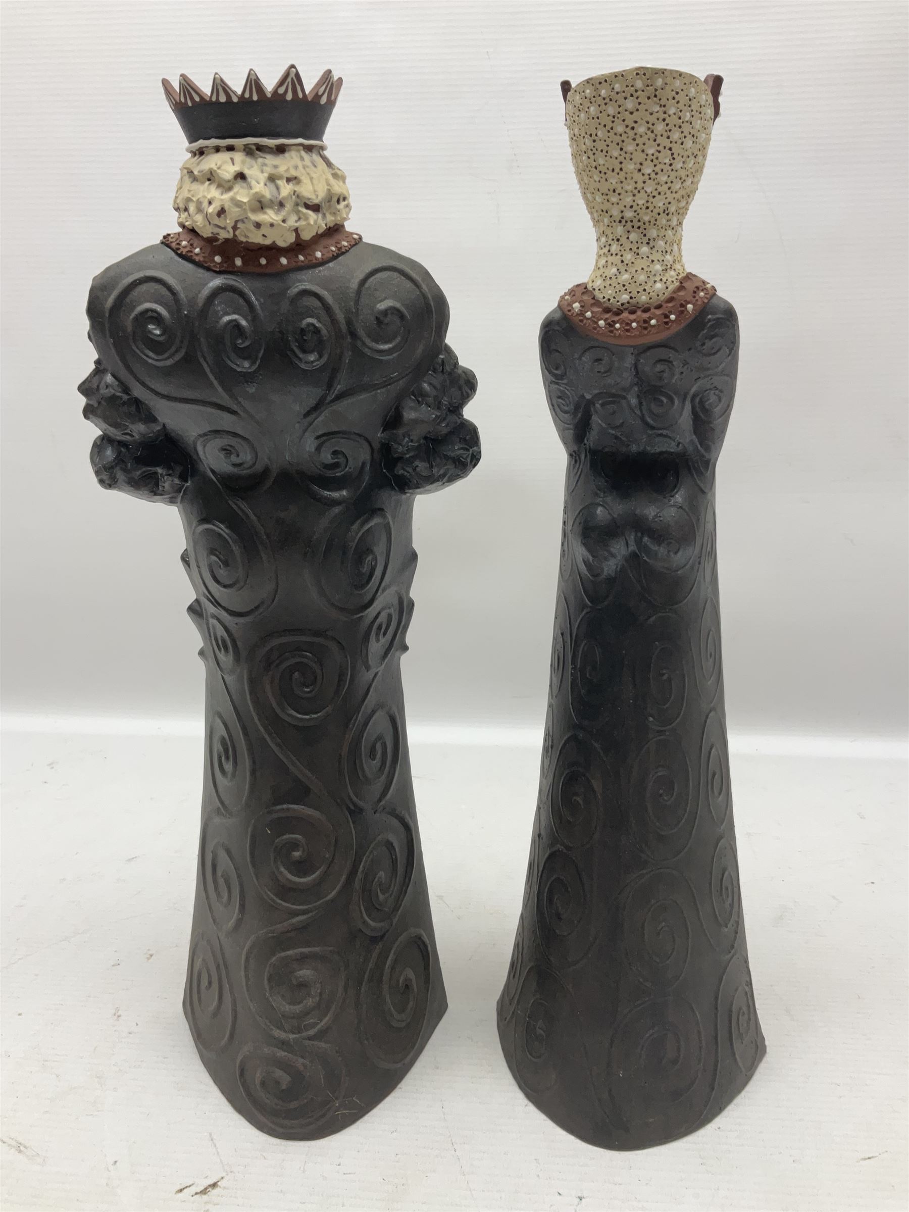 Leonard Stockley; two studio pottery figures modelled as a king and queen, both signed beneath,  H35cm