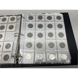 Mostly Queen Elizabeth II fifty pence coins, many being United Kingdom, including 1994 'D-Day', 1998 'NHS', 2006 'Victoria Cross', 2016 'Swimming', 2016 'Beatrix Potter', 2018 'Mrs Tittlemouse' etc, housed in a ring binder folder 