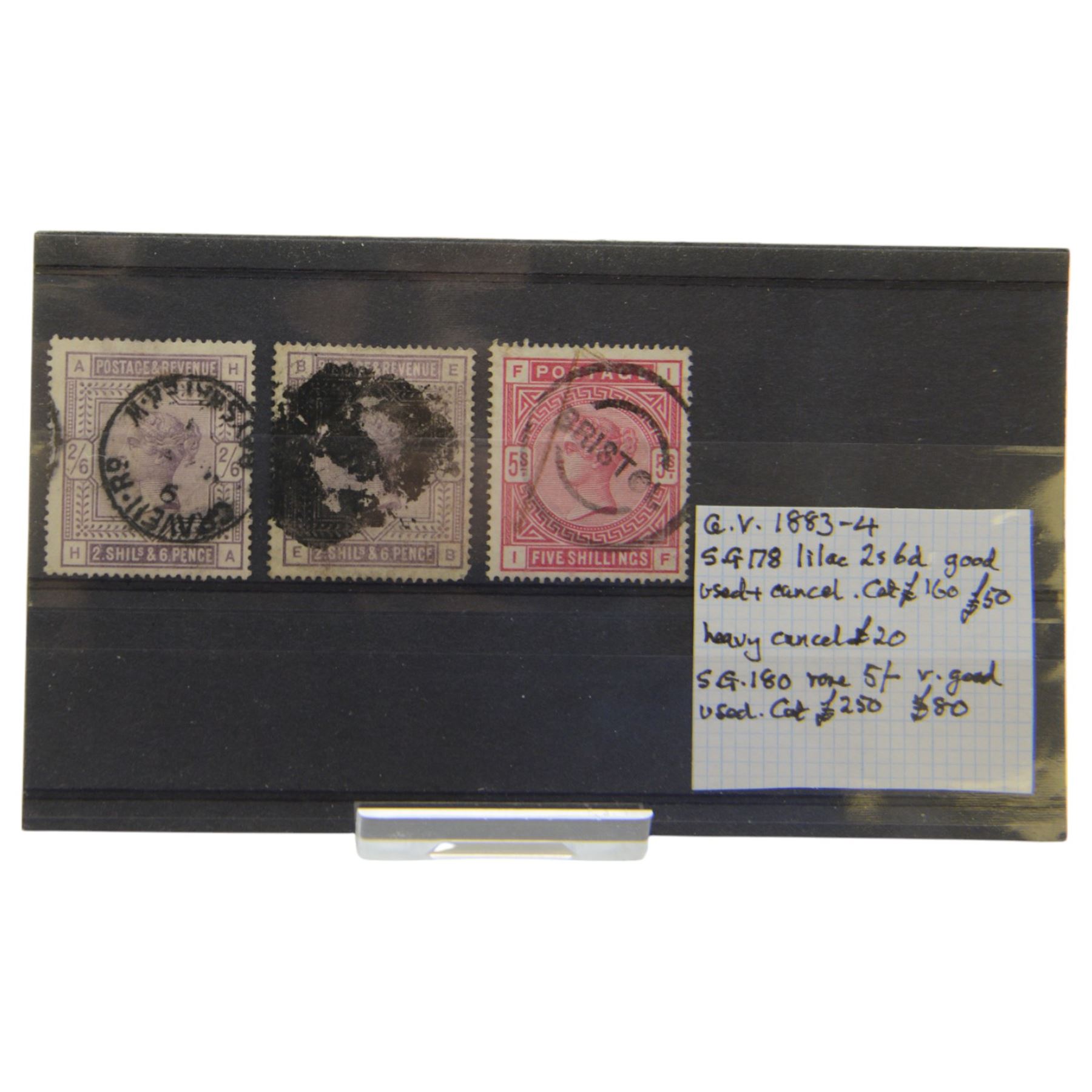 Two Queen Victoria two shilling and six pence stamps and five shilling with 'Bristol' cancel, housed on a stockcard