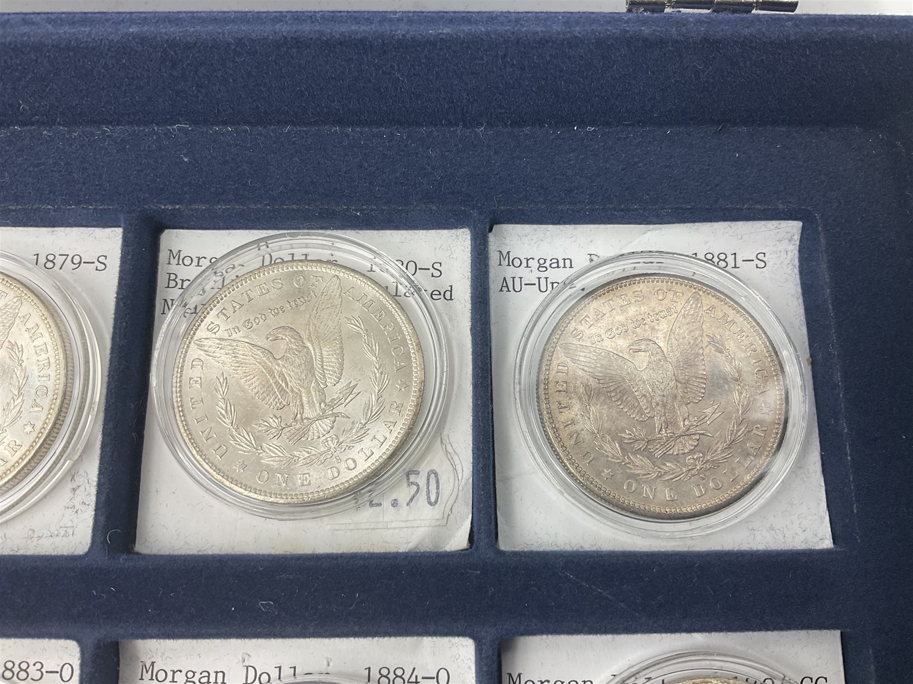 Twelve United States of America silver Morgan dollar coins, dated 1878 S, 1879 S, 1880 S, 1881 S, 1882 O, 1883 O, 1884 O, 1884 CC, 1885 O, 1886, 1887 and 1888
