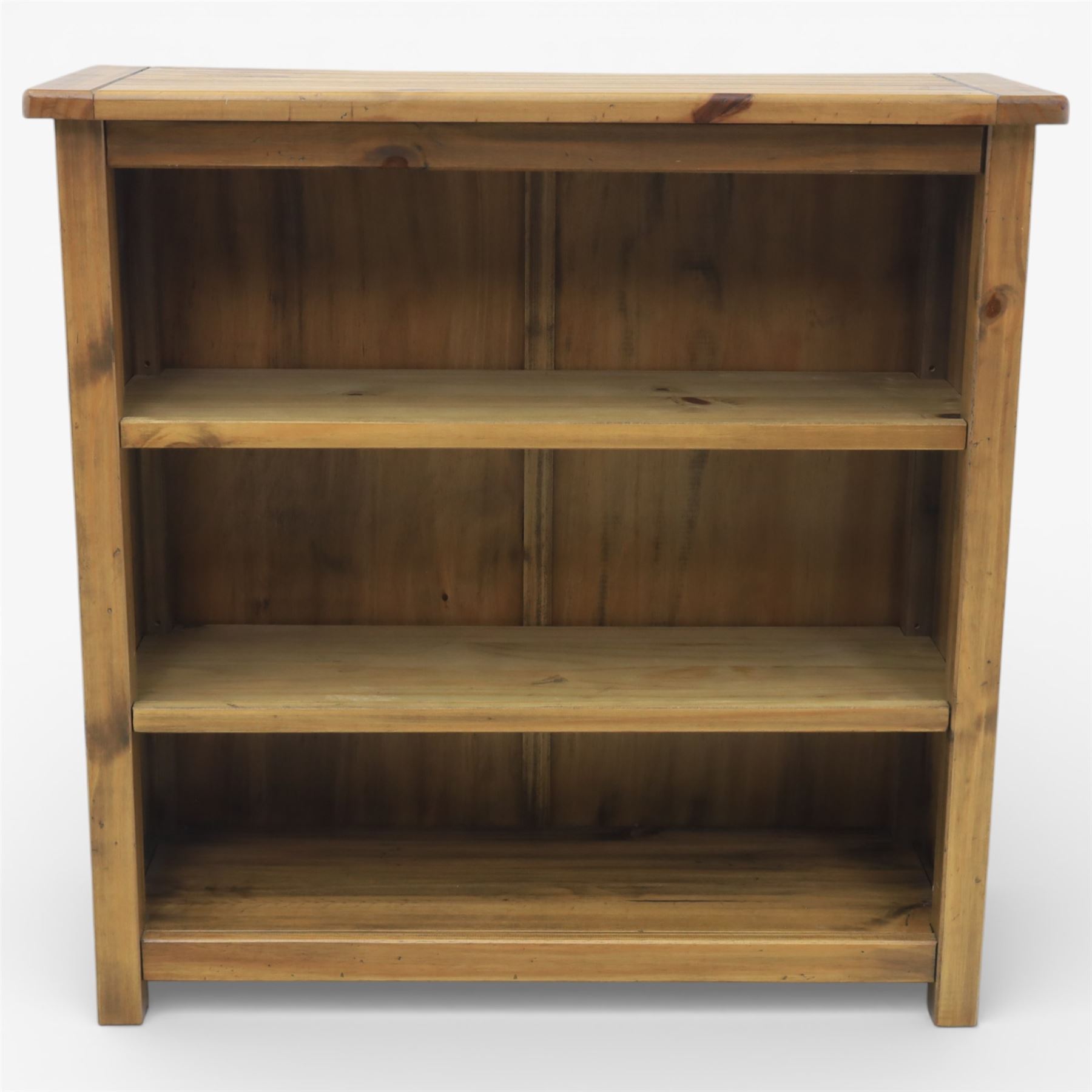 Contemporary pine open bookcase, fitted with two shelves