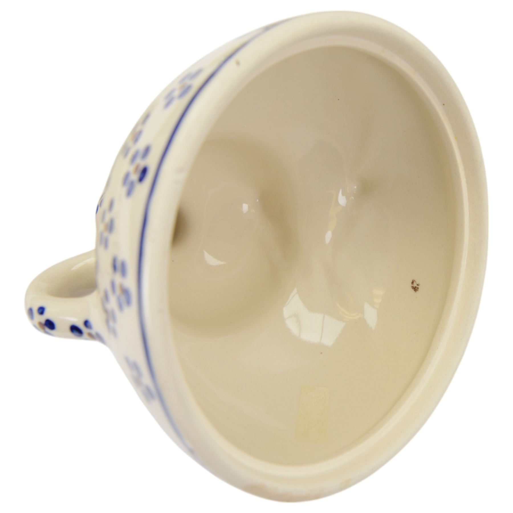 Collection of Ceramika Artystyczna Boleslawiec ceramics and similar Polish ceramics, including cheese dome in the form of a lady, chopping board, fruit bowl and figural candlestick