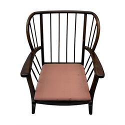 Joynson Holland - pair of mid-20th century stained beech framed easy chairs, shaped back and flat armrests over floral tapestry cushioned seat and back, on splayed supports united by stretcher