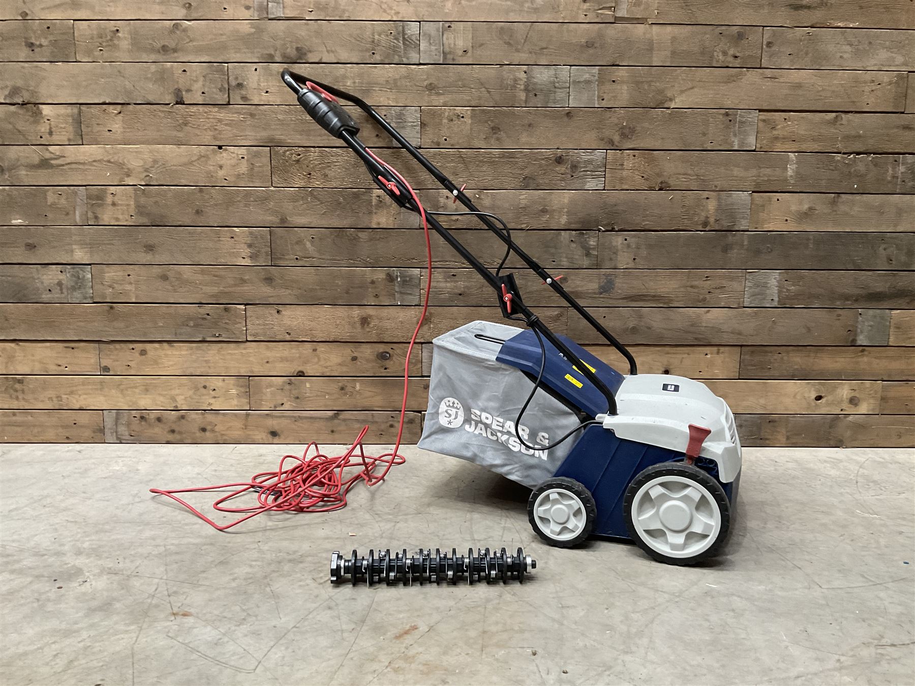 Petron PWR21CCGTA strimmer and a Spear & Jackson 1400W 2in1 Scarifier & Raker