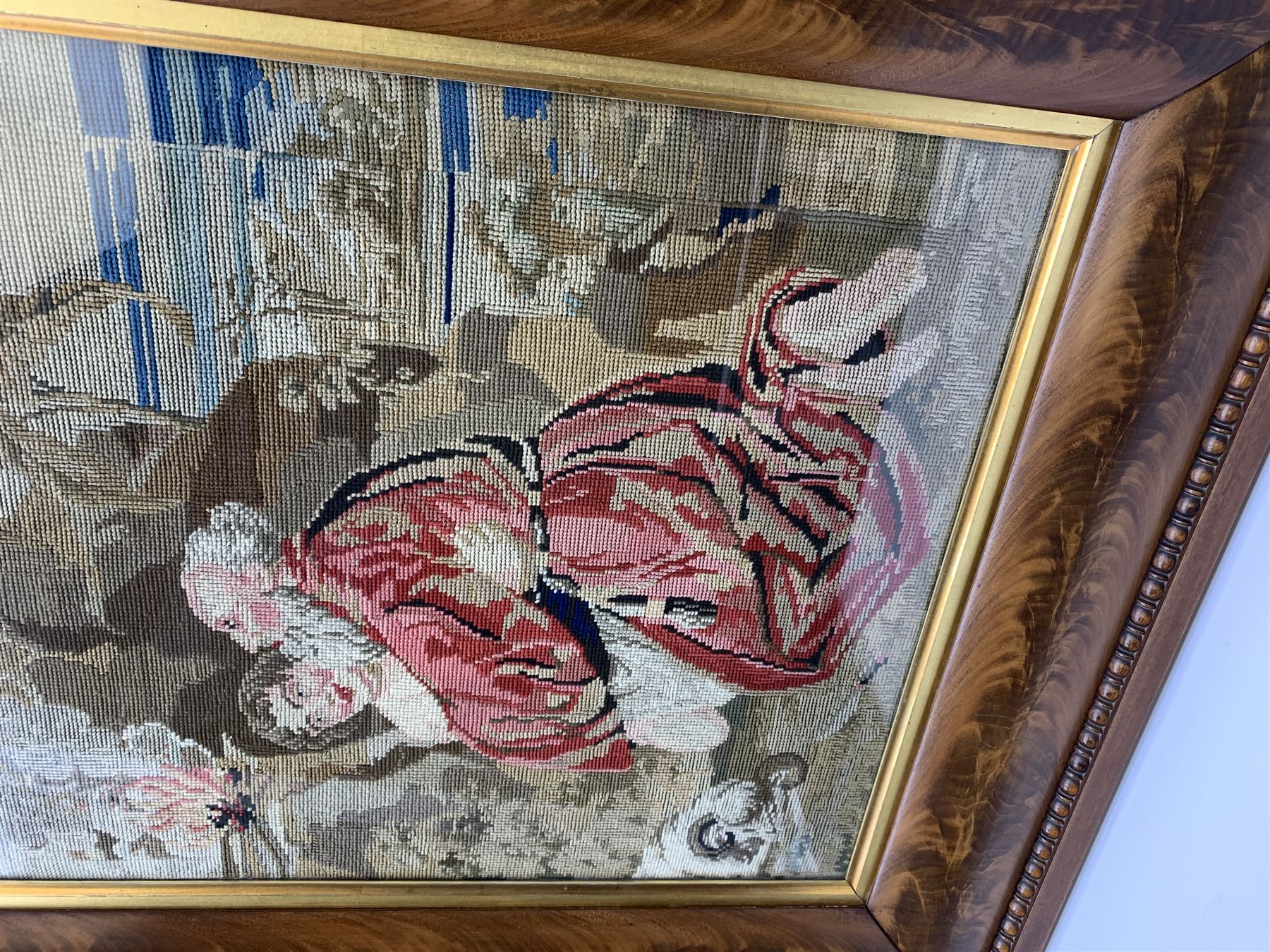 FRAMES - Victorian figured mahogany frame, with egg and dart edging and a gilt slip, containing a Berlin woolwork picture depicting Abraham and Isaac, H78cm W69.5cm