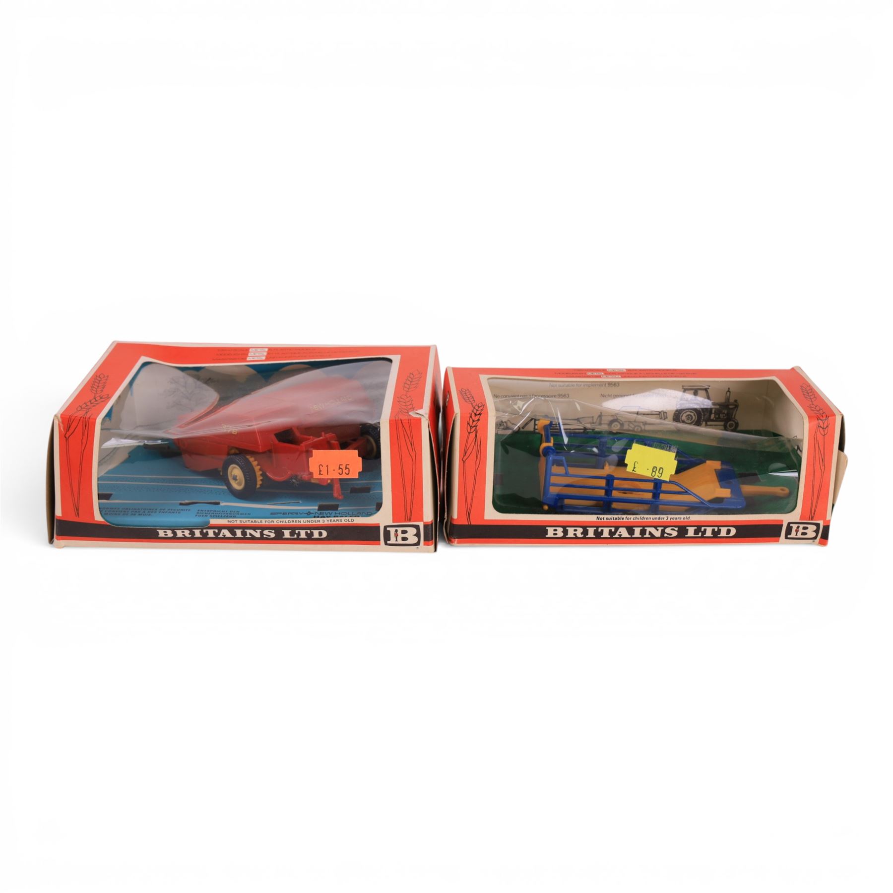 Britains Ltd 1:32 scale farm implements, comprising no. 9556 Hay Baler, no. 9549 Manure Spreader, no. 9553 Disc Harrow, no. 9557 Bale Sledge, no. 9577 Seed Drill, no. 9561 Cultivator Herse, no. 9546 Ploughs and no. 9558 Wheeled Trailer, all boxed