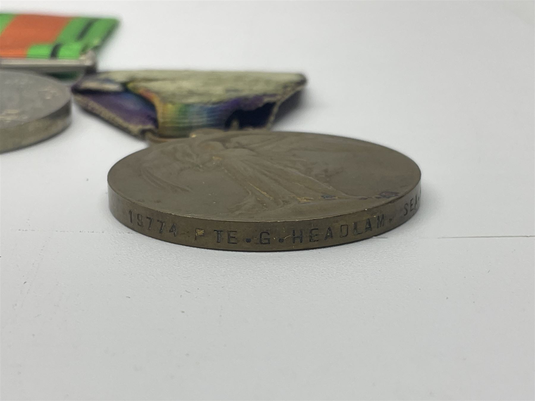 WW1 pair of medals comprising British war medal and Victory Medal awarded to 19774 Pte. G. Headlam Sea. Highrs.; another WW1 pair of medals comprising British War Medal and Mercantile Marine Medal awarded to Charles Filburn; WW2 group of five medals comprising 1939-45 War Medal, Defence Medal, 1939-45 Star, Africa Star and Burma Star; in issue box addressed to Mr. H, Smithson with medal slip; all with ribbons; and Edward VIII Coronation medal (10)