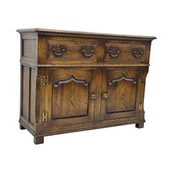 Early 20th century Jacobean design oak dresser sideboard, rectangular top with moulded edge over two baize-lined drawers with pierced handles, above two fielded panel cupboard doors, on stile supports