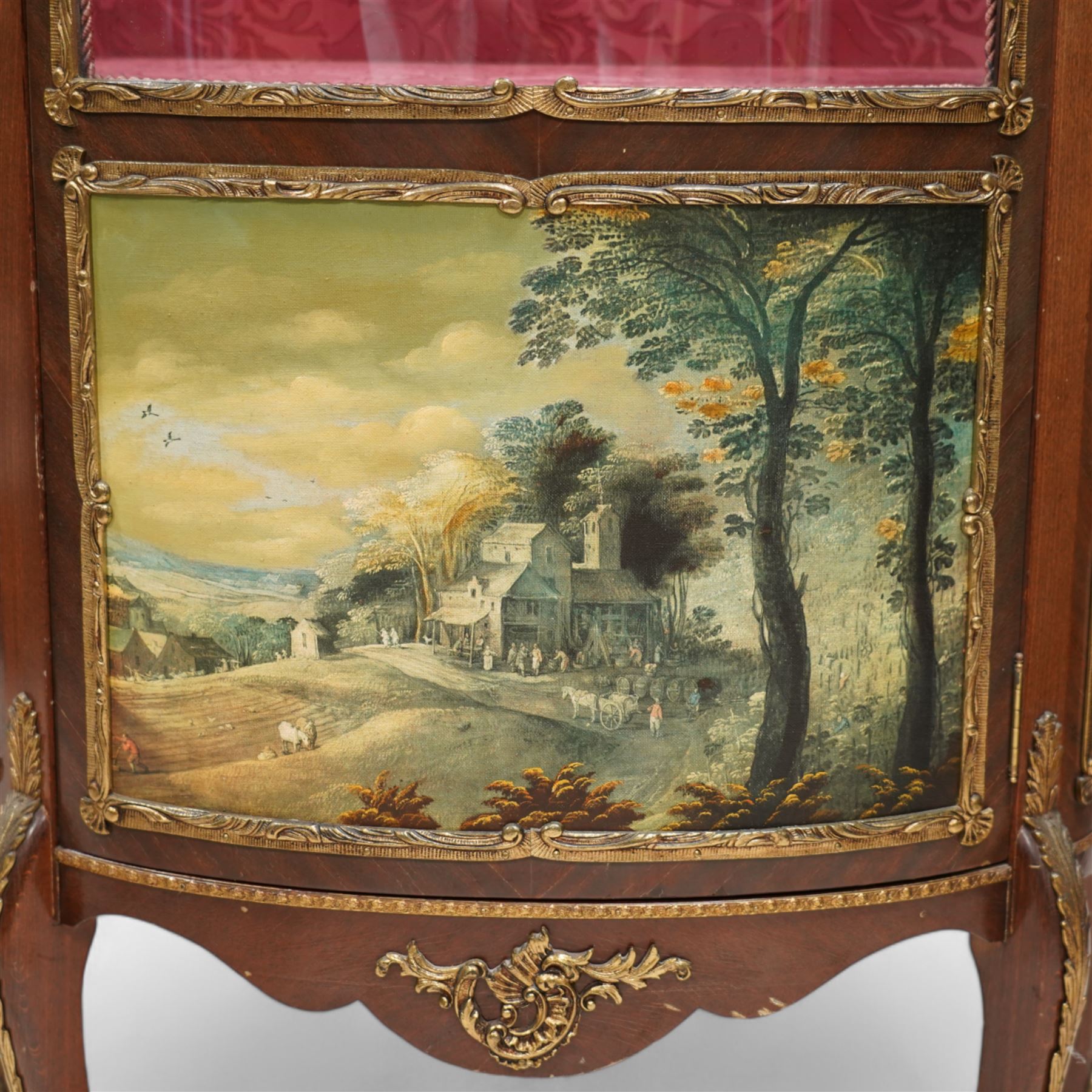 Mid-20th century rosewood vitrine display cabinet, shaped form with cast gilt metal gallery and mounts, enclosed by glazed door with Vernis Martin design panel, fabric lined interior with two glass shelves, on cabriole supports with cast acanthus leaf mounts 