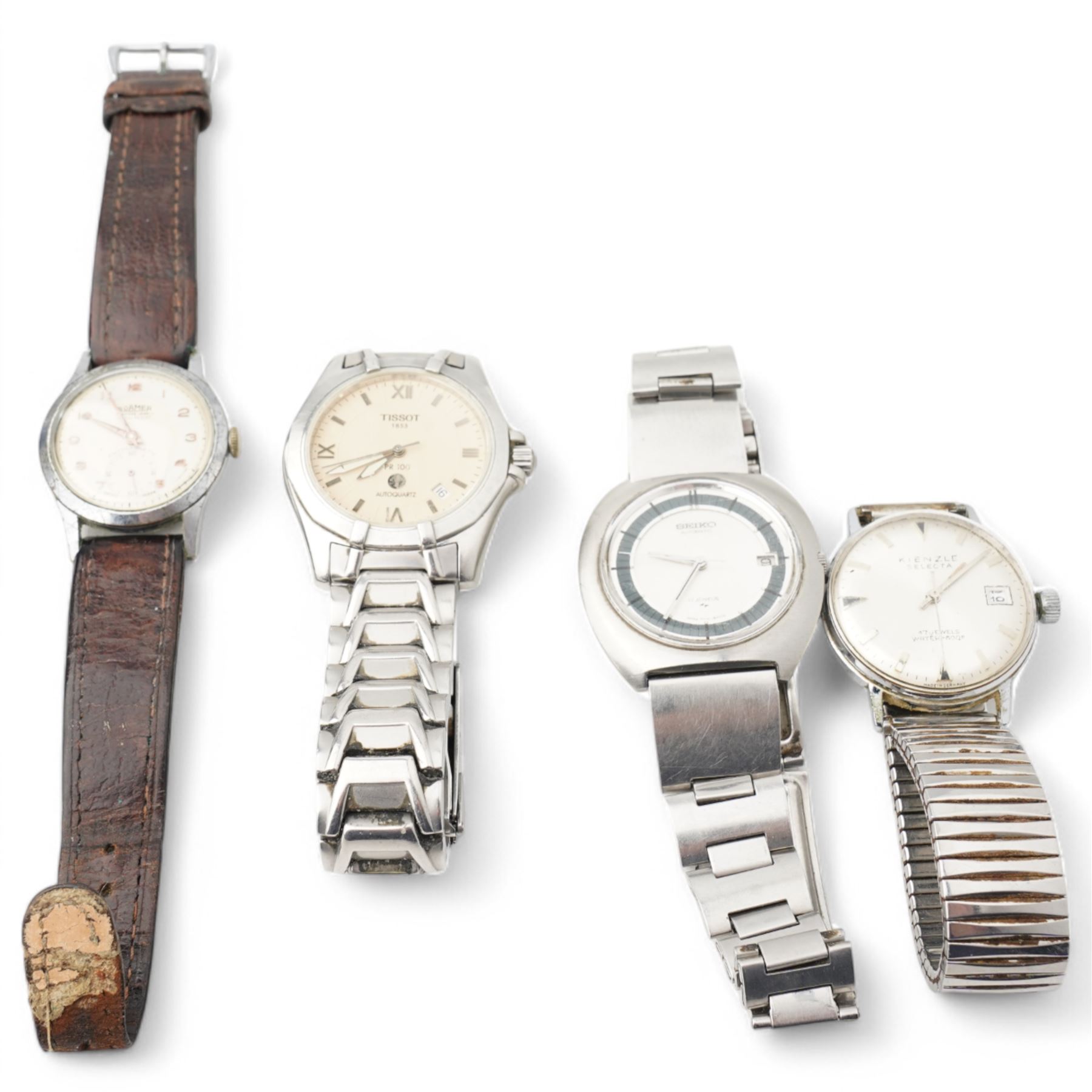 Five watches including Tissot Autoquartz, Seiko automatic, Roamer, Kienzle Selecta and Rotary