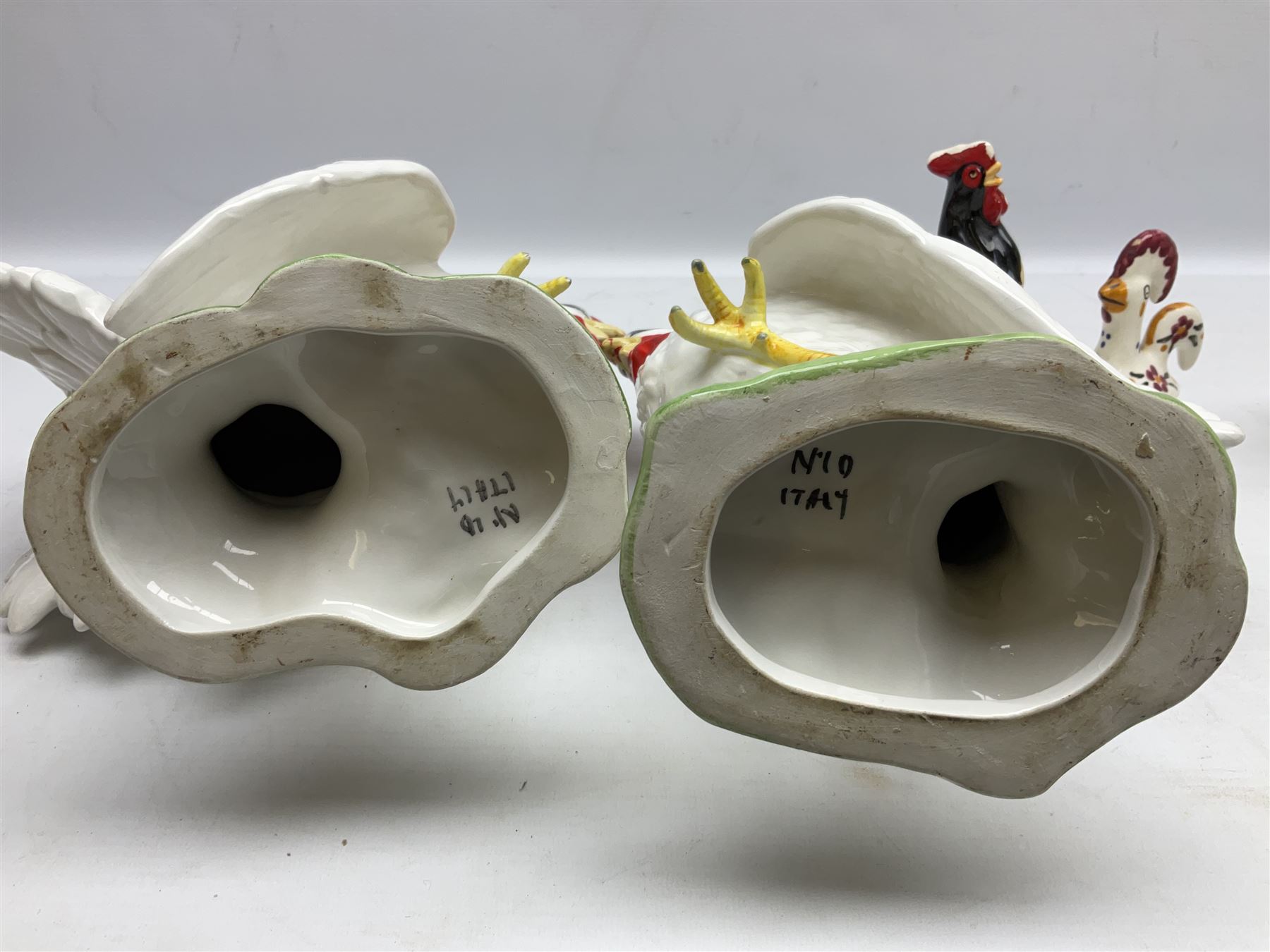 Pair of fighting cockerels from Italy together with three other ceramic cockerels, largest H30cm 