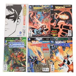 Seventy-eight modern DC comic books circa 2012-2014, including Batman, Batman Eternal, Batman The Dark Knight, Batman Detective, Teen Titans and Batgirl, together with a 1988 DC Batgirl #1 