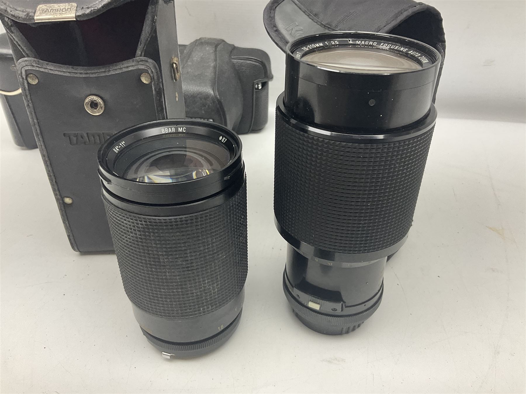 Collection of camera bodies and lenses, to include Olympus OM-1 camera body, serial no 106567, with 'Olympus OM-System F.Zuiko Auto-S 1:1.8 f=50mm' lens, serial no 135097,  Zenit-B camera body, serial no 71017867, with 'Helios-44-2 2/58' serial no 7500040, Voigtlander Vito B camera body, with 'Voigtlander Colour Skopar 1:2.8/50' lens, 'Olympus OM-System Zuiko Auto-Zoom 1:4 f=75-150mm' lens serial no 104321, 'Tamron SP 35-210mm 1:3.5-4.2' lens etc 